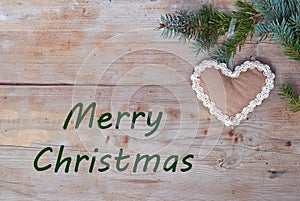 Natural Christmas greetings with gingerbread heart