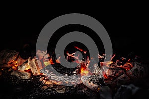 Natural coals burning in a meat spit