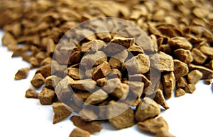 Natural coffee in granules close up