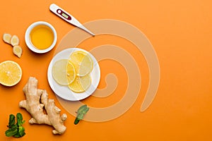 Natural cold and flu home remedies and thermometer. Natural ingredients for immunity stimulation and viruses protection