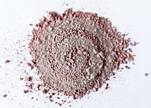 Natural colored pigment powder close up, matt brown eyeshadow pi