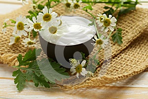 Natural cosmetic cream lotion with camomile