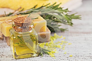 Natural cosmetic oil and natural handmade soap with rosemary on