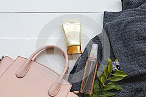 Natural cosmetics sunscreen spf50 and accessories of woman