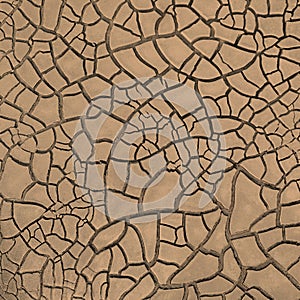 Natural cracks pattern, dried wasteland with cracked brown mud