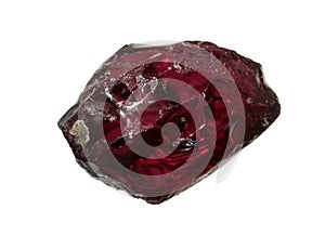 Natural crimson crystal of garnet-pyrope mineral