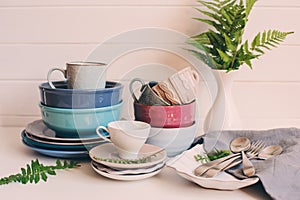 natural crockery tableware on wooden background.