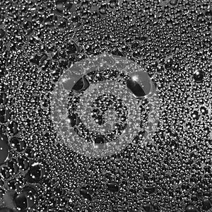 Natural dark silvery black water dew drops texture macro background, vertical textured wet vapour bubble splashes pattern copy