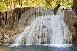 Natural deep forest waterfall