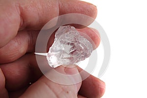 Natural diamond in the human hand