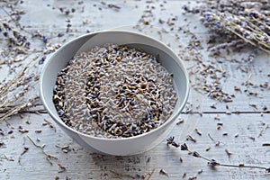 Natural dry lavender flowers tea in ceramic bowl