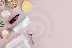 Natural eco friendly beauty skin care products with white tube mockup flat lay on beige background