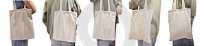 Natural fabric eco tote bag mockup in hand. Woman with shopper, totebag isolated on white