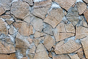 Natural facade stone decoration quartzite background texture. modern granite stone wall