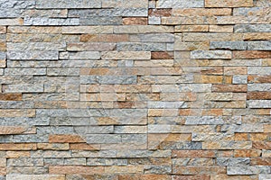 Natural facade stone decoration quartzite background texture. modern granite stone wall