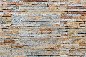 Natural facade stone decoration quartzite background texture. modern granite stone wall