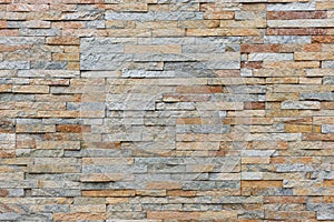 Natural facade stone decoration quartzite background texture. modern granite stone wall