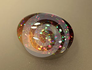 Natural fire play-of-colour opal Welo photo