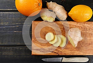 Natural flu and cold remedy - orange and lemon fruit, fresh ginger