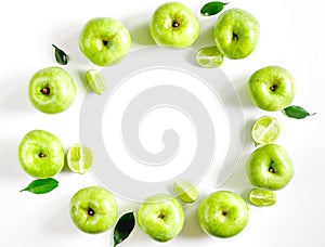 natural food design with green apples and leaves white desk background top view mock up