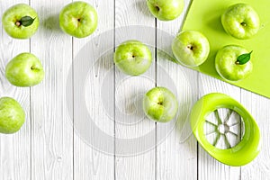 Natural food design with green apples white desk background top view mock up