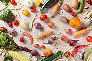 Natural food on kitchen table. Autumn vegetables and crop top view.