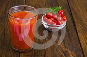 Natural freshly squeezed tomato juice in glass