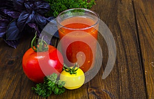 Natural freshly squeezed tomato juice in glass