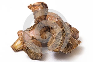 Natural galangal rhizomes in indonesia called lengkuas or laos are used in traditional asian cuisines,