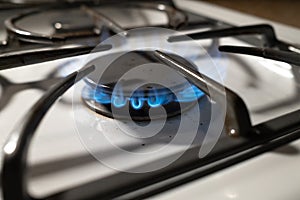 Natural Gas Flames on a White Gas Stove