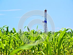 Natural Gas Fracking Drill in Cornfield photo