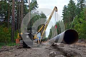 Natural gas pipeline construction work. A dug trench in the ground for the installation and installation of industrial gas