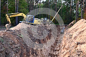 Natural gas pipeline construction work. A dug trench in the ground for the installation and installation of industrial gas and oil