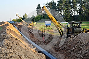 Natural gas pipeline construction work. A dug trench in the ground for the installation and installation of industrial gas and oil