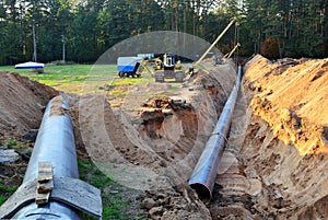 Natural gas pipeline construction work. A dug trench in the ground for the installation and installation of industrial gas and oil