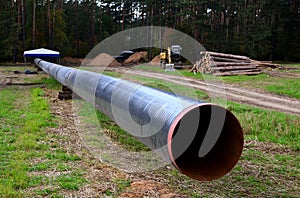 Natural gas pipeline construction work. A dug trench in the ground for the installation and installation of industrial gas and oil