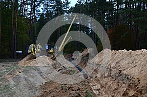 Natural gas pipeline construction work. A dug trench in the ground for the installation and installation of industrial gas and oil