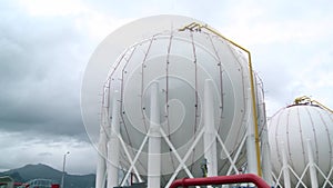 Natural gas tank in the Refinery industry cloudy day