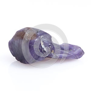 Natural gemstone purple charoite isolated on white background