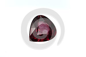 Natural gemstone rhodolite garnet isolated on white background