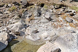 Natural geothermal hot spring in Idaho - Sacajawea Hot Springs in Grandjean. Hot water flows down from the mountains into the photo
