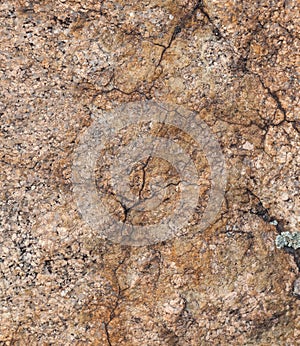 Natural granite stone texture background. Rough and rusty. Close-up