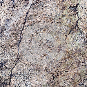 Natural granite stone texture background. Rough and rusty. Close-up photo