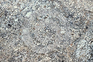 Natural granite texture closeup for background.