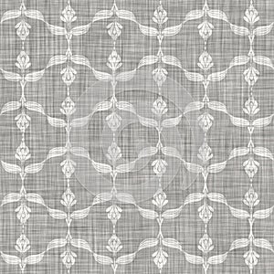 Natural gray french woven linen texture background. Old ecru flax paisley motif seamless pattern. Organic yarn close up