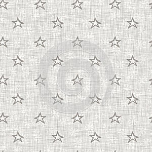 Natural gray french woven linen texture background. Old ecru flax star motif seamless pattern. Rough greige starry block