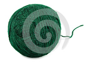 Natural green fine wool ball and thread, isolated clew macro closeup