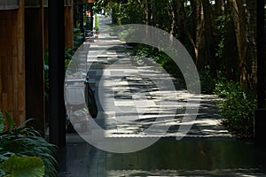 Natural half building hotel walkway with maid cart