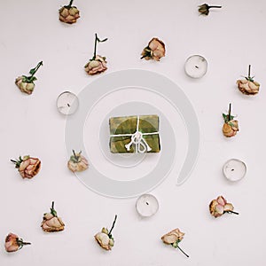 Natural handmade Soap in a frame of flowers on white background. Flat lay, top view mockup copy space template.