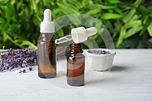 Natural herbal oil in glass bottles